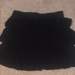 Black ruffled mini skirt